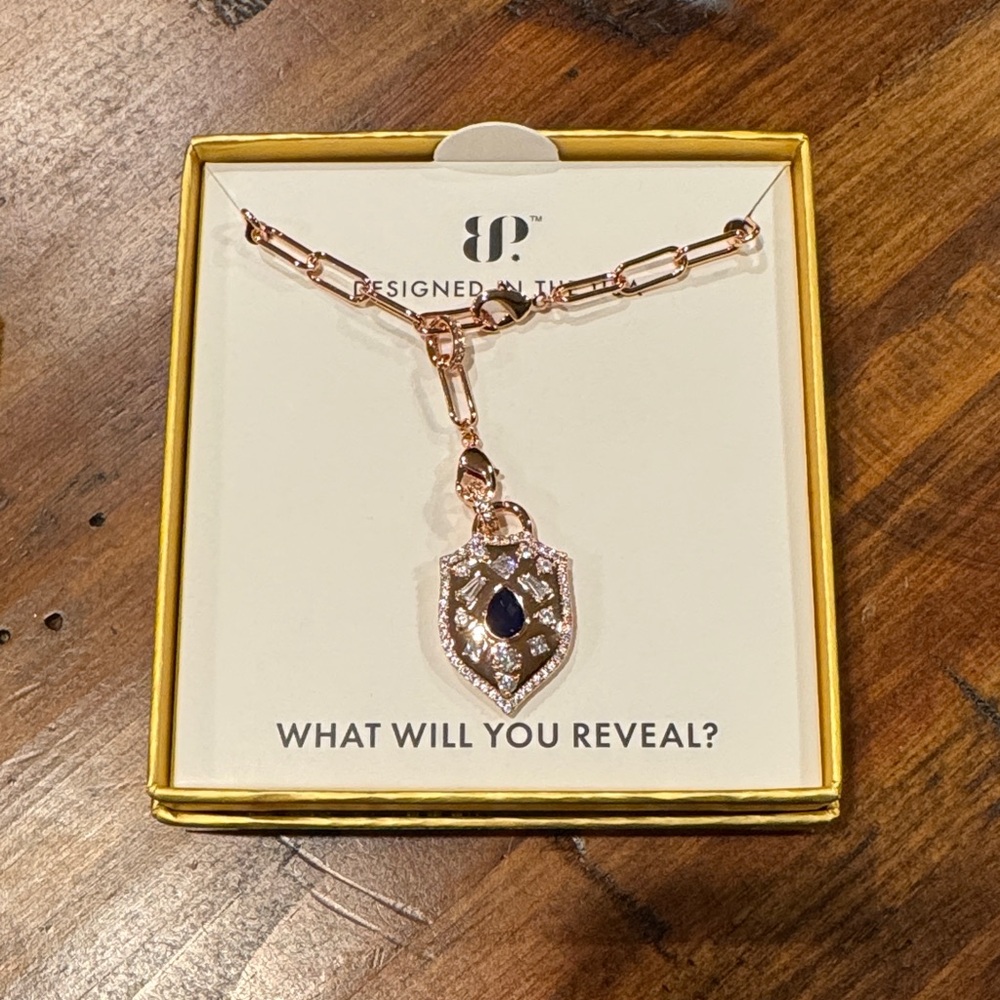 Bomb Party Rose Gold Shield Pendant Necklace with Dark Blue Stone